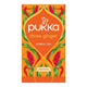 Pukka three ginger herbal tea orange package on a white background. 