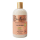 A 13 fl oz bottle of Shea Moisture Curl & Shine Shampoo on a solid white background. The bottle is a warm cream color with a metallic gold cap and a peach-colored label featuring black text.