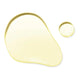 A translucent pale yellow liquid, shown as a large irregular droplet and a smaller round droplet on a plain white background.
