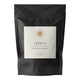 Black package of Chaga supplement with a white label on a white background