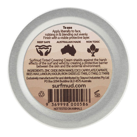 Surfmud Natural Zinc Tinted Covering Cream 45g round tin turned over to show the lid back with small print and a barcode on white