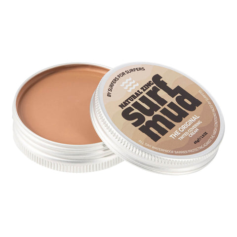 Surfmud Natural Zinc Tinted Covering Cream 45g open tin showing tan tinted cream, with the lid beside it on a plain white background