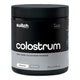 150g container of Switch Nutrition colostrum powder on a white background. Unflavoured.