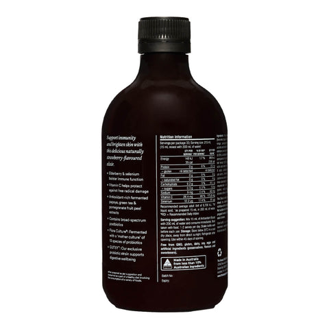 The Beauty Chef Antioxidant Boost 500ml dark glass bottle turned to show the back label with a nutrition table on a plain white background