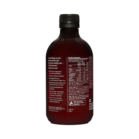 The Beauty Chef Hydration Boost 500ml dark glass bottle turned to show the back label with a nutrition table on a plain white background