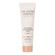The Jojoba Company Illuminating Tinted Moisturiser SPF15 Light 50ml in a cream squeeze tube with a rose gold cap, standing upright on white