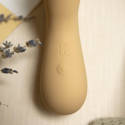 The Natural Love Company Camphor, a classic rabbit vibrating dildo without the bunny ears, replaced by a clitoral suction cup.