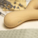 The Natural Love Company Camphor, a classic rabbit vibrating dildo without the bunny ears, replaced by a clitoral suction cup.