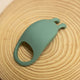 The Natural Love Company Cilantro, a rabbit eared cock ring, with a recycled ocean plastic core and buttery smooth sanitary grade silicone exterior, finished in a contemporary peacock blue. Designed for a fusion of pleasure for both partners during partnered sex.