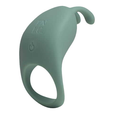 The Natural Love Company Cilantro, a rabbit eared cock ring, with a recycled ocean plastic core and buttery smooth sanitary grade silicone exterior, finished in a contemporary peacock blue. Designed for a fusion of pleasure for both partners during partnered sex.