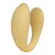 The Natural Love Company Cistus, a remote controlled (remote included) U-shaped vibrator with dual vibrating motors (one at each end), it's crafted with a recycled ocean plastic internal body dressed in a buttery smooth silicone casing, which comes in a creamy yellow hue.