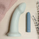 The Natural Love Company Dill G-Curve, a silicone dildo with 6 inches of insertable length and girth of 5 inches at its thickest insertable point.