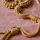 The Natural Love Company Kanuka Handcuffs, soft handcuffs with control cord.