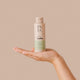 Hand holding The Natural Love Company Simply Lube - Natural Aloe Vera, a water-based lubricant only using natural ingredients.