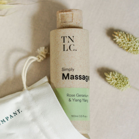 The Natural Love Company Simply Massage Oil, a coconut-based massage oil made from natural and organic ingredients, with the subtle notes of rose geranium and ylang ylang.