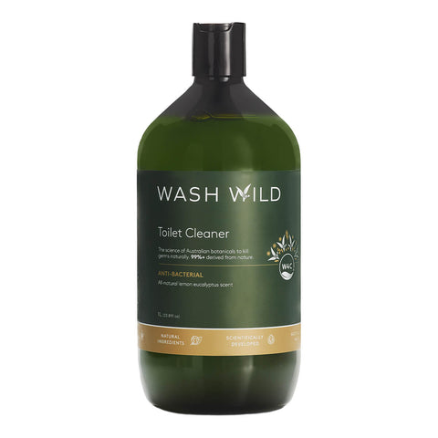 Wash Wild Toilet Cleaner 1L in a green glass bottle with a black cap and a gold band, front view on a plain white background, clear product photo