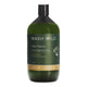 Wash Wild Toilet Cleaner 1L in a green glass bottle with a black cap and a gold band, front view on a plain white background, clear product photo