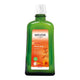 Weleda Arnica Muscle Soak 200ml in a green glass bottle with an orange label and white cap, front view on a plain white background