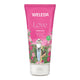 200ml tube of Weleda Love Shower Cream Rose. Pink packaging with illustration of a woman picking roses in a field. 