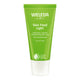 Green tube of Weleda Skin Food Light on a white background